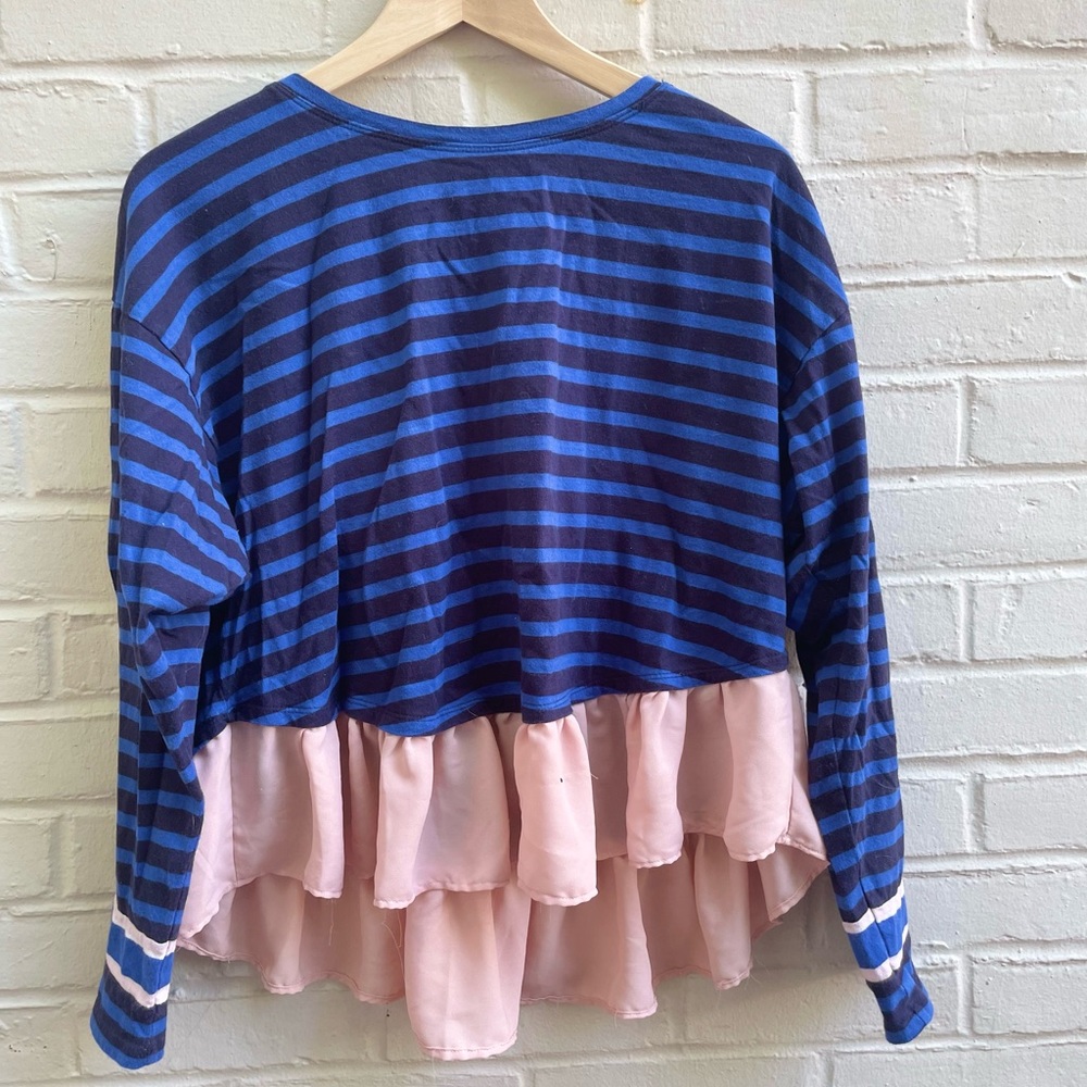 Deletta top, blue and navy stripes with a pink ruffle